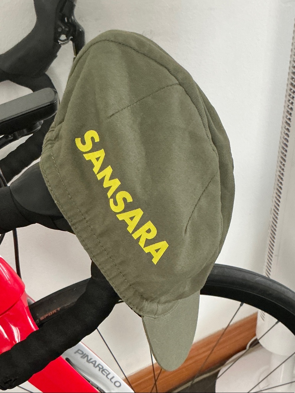 Samsara Women’s Olive Cycling Cap with Yellow Logo Never worn